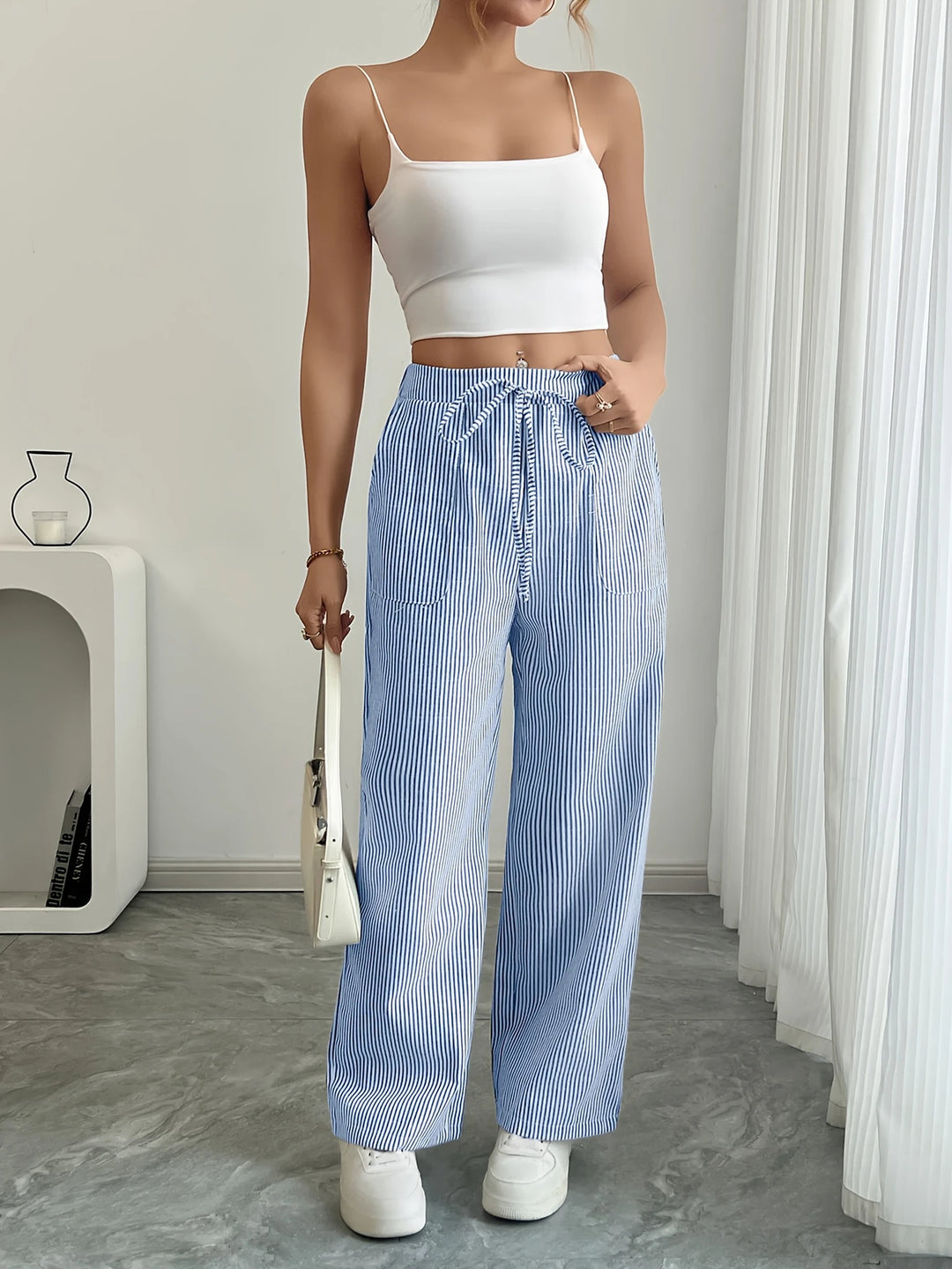 Rayla | Le pantalon large rayé qui libère votre élégance